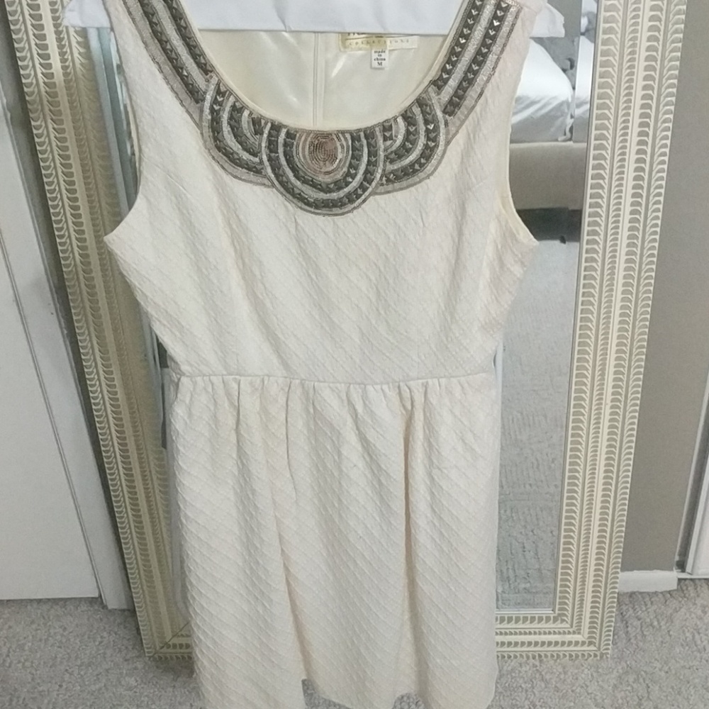 Cream textured dress with decorative collar